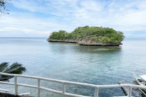 an island in the middle of the ocean at La Puerta Al Paraizo Guimaras powered by Cocotel in Guimaras