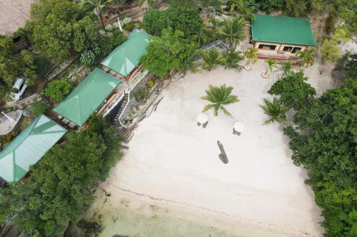 an aerial view of an island with elephants on a beach at La Puerta Al Paraizo Guimaras powered by Cocotel in Guimaras