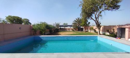 Bazén v ubytování The GetAway nebo v jeho okolí