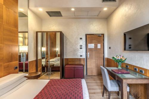 Ένα ή περισσότερα κρεβάτια σε δωμάτιο στο Kolbe Hotel Rome
