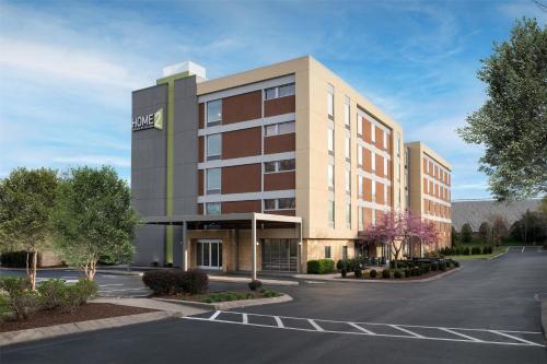 a rendering of the office building at the campus at Home2 Suites Nashville Airport in Nashville