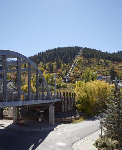 a bridge over a road with a roller coaster at Hyatt Place Park City in Park City