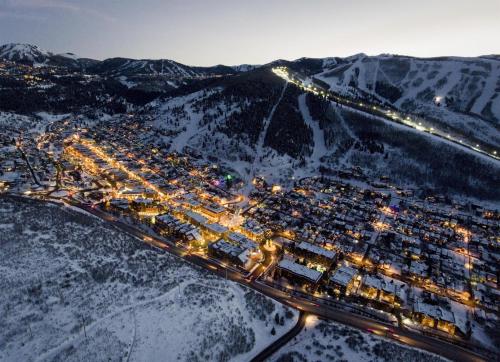 an aerial view of a city in the snow at night at Hyatt Place Park City in Park City
