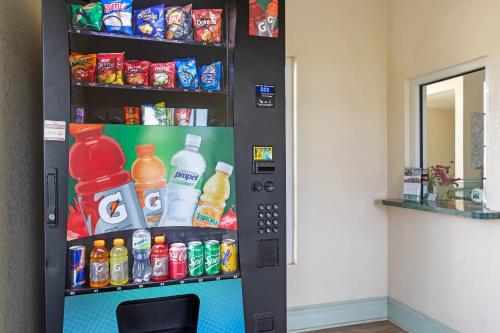 a vending machine filled with lots of drinks at Quality Inn Andrews in Andrews