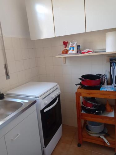 Dapur atau dapur kecil di Villetta FlamingoBeach Morghella