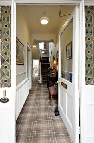 an internal hallway of a home with a hallway at Bronte Guest House in York