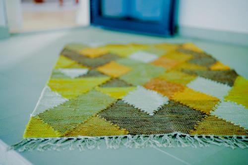 a colorful rug sitting on a counter top at Noya Yas Island Luxury Retreat 5 Star Stay in Abu Dhabi