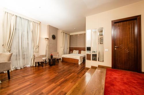 Passage Luxury Rooms Hotelにあるベッド
