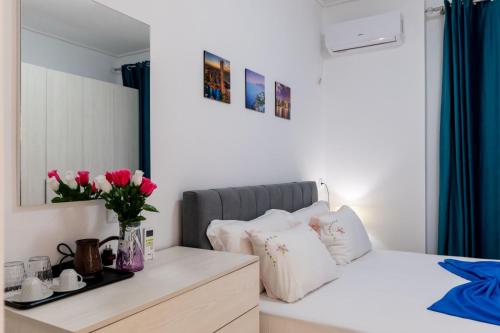 Llit o llits en una habitació de Vila Basho