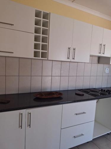 Kuchyň nebo kuchyňský kout v ubytování Ehenye Villa