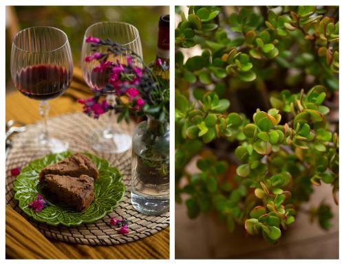 a table with a plate of food and a glass of wine at La Casa di Marco, holidays, sea and nature in Montiano