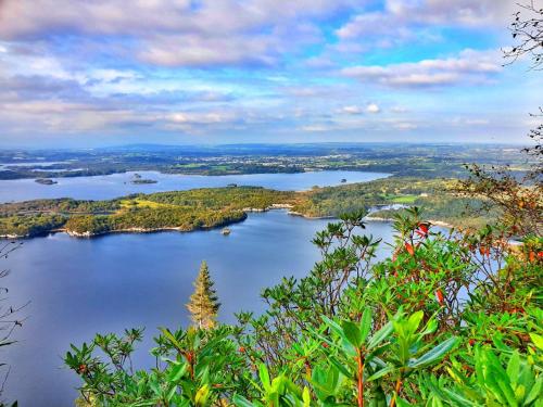 an aerial view of a large body of water at Killarney Randles Hotel in Killarney