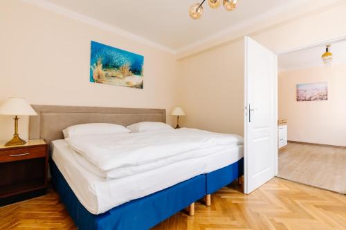 Ένα ή περισσότερα κρεβάτια σε δωμάτιο στο Apartments TGM 11