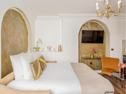 Posteľ alebo postele v izbe v ubytovaní Merveil - Luxury Suite - Louvre - Rousseau