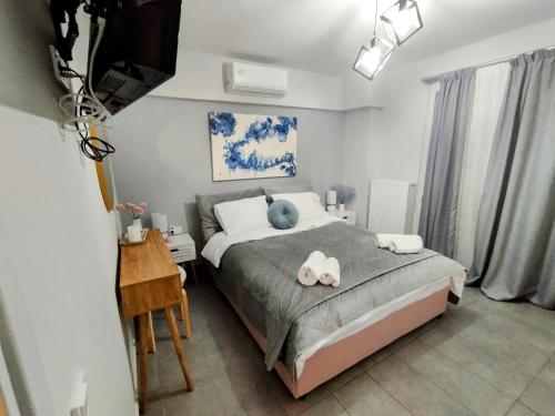 Кровать или кровати в номере ARTica condo