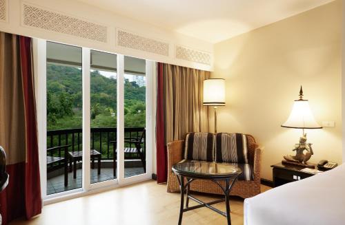 Postel nebo postele na pokoji v ubytování Siam Bayshore Resort Pattaya