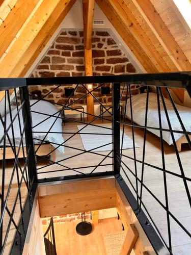 an overhead view of a loft with a brick wall at Grange Des Rêves in Lichtenberg