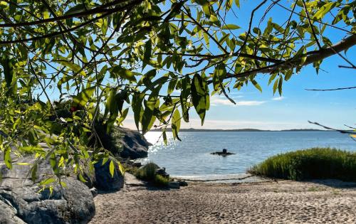 a person in a boat in the water at Sillvik C&J Hugosson in Sanden