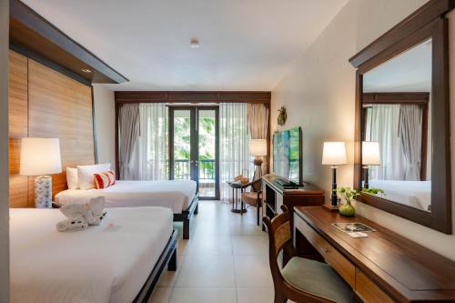 Postel nebo postele na pokoji v ubytování Siam Bayshore Resort Pattaya