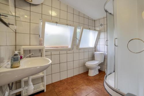 Kúpeľňa v ubytovaní Domek na Mazurach