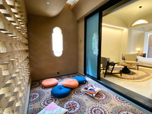a room with a view of a living room at turpan Ah Fanti Village in Turfan