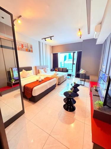 Кровать или кровати в номере Luxury Axon Residence Bukit Bintang Suites KLCC PAVILION