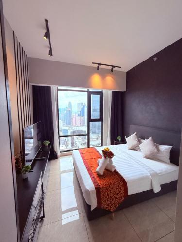Кровать или кровати в номере Luxury Axon Residence Bukit Bintang Suites KLCC PAVILION