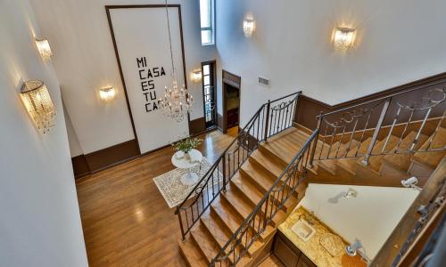 an image of a staircase in a building at 6BR-Music Studio-Pool-Spa & Games in Sherman Oaks