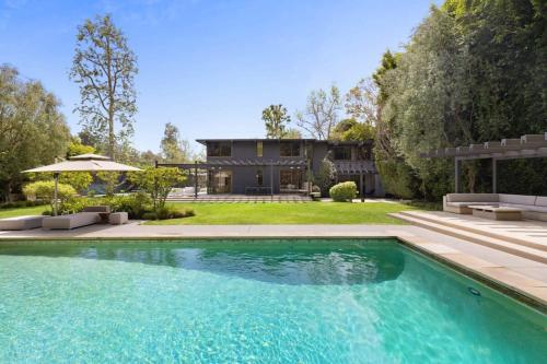 Πισίνα στο ή κοντά στο Malibu Reserve by Stay Awhile Villas
