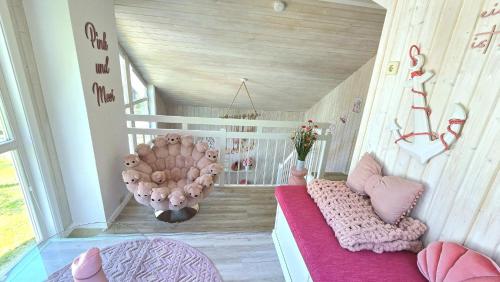 Ruang duduk di Pink und Meer - Meerblick, Sauna, Kamin & Whirlpool