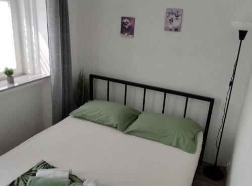 Ένα ή περισσότερα κρεβάτια σε δωμάτιο στο Apartment Leo Povile