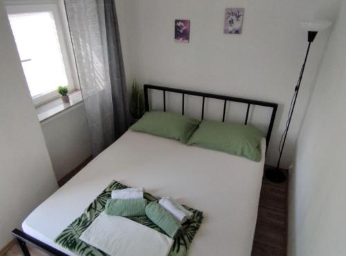 Ένα ή περισσότερα κρεβάτια σε δωμάτιο στο Apartment Leo Povile
