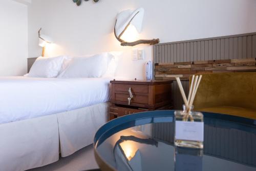 Ένα ή περισσότερα κρεβάτια σε δωμάτιο στο Hôtel Dolce Notte