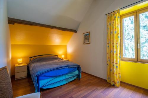 Postel nebo postele na pokoji v ubytování Gite Vergnelibert