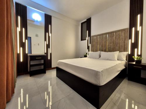 Postel nebo postele na pokoji v ubytování Shiloh Apartments