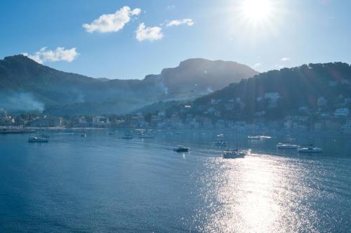 a large body of water with boats in it at Salino Port Soller in Port de Soller