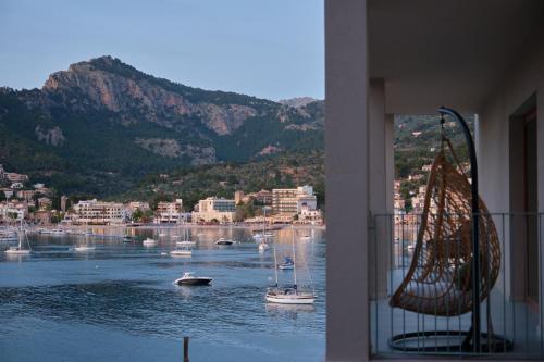 a view of a harbor with boats in the water at Salino Port Soller in Port de Soller