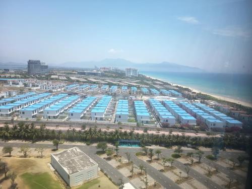 an aerial view of a large port with the ocean at Sarang Arena Cam Ranh Seaview Resort condotel in Cam Ranh International Airport