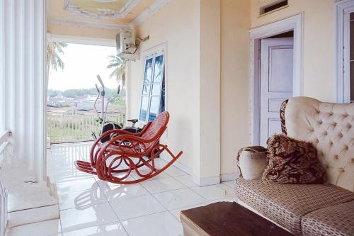 Гостиная зона в RedDoorz at Pondokan Kapuas 5 Bengkulu