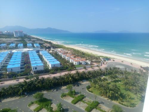 an aerial view of the beach and the ocean at Sarang Arena Cam Ranh Seaview Resort condotel in Cam Ranh International Airport