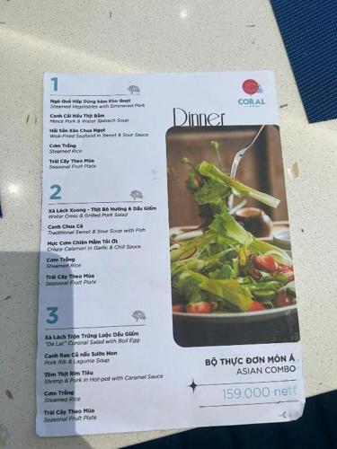 a menu for a dinner with vegetables on a table at Sarang Arena Cam Ranh Seaview Resort condotel in Cam Ranh International Airport