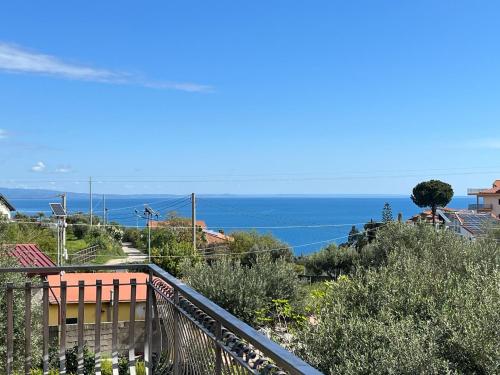a view of the ocean from a balcony at Villa Marina in Soverato Marina