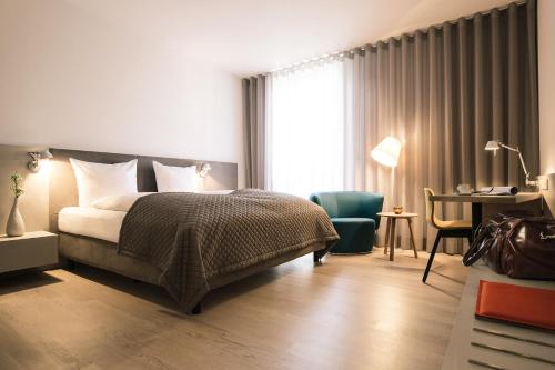 Letto o letti in una camera di Maximilians Boutique-Hotel Landau
