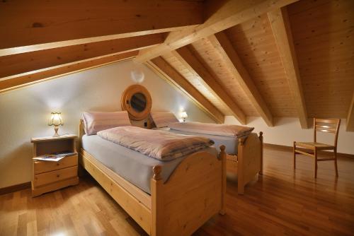 Postel nebo postele na pokoji v ubytování Baita Mirtillo