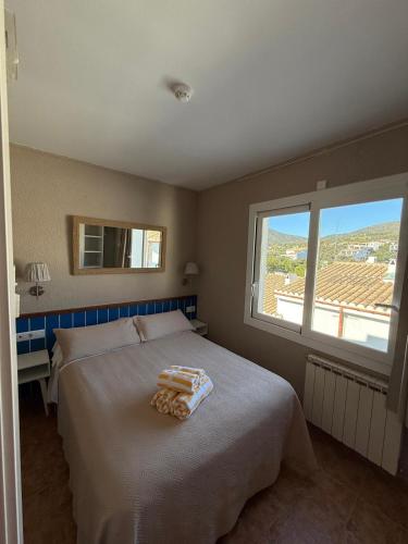 Ένα ή περισσότερα κρεβάτια σε δωμάτιο στο La Fonda
