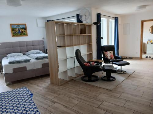 Postel nebo postele na pokoji v ubytování Apartement auf dem Lande