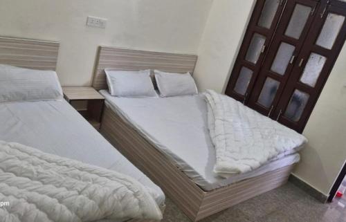 Postel nebo postele na pokoji v ubytování BRN Resort