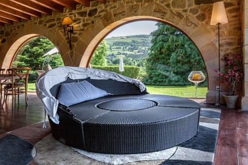 Χώρος καθιστικού στο Casona Los Fresnos, con piscina