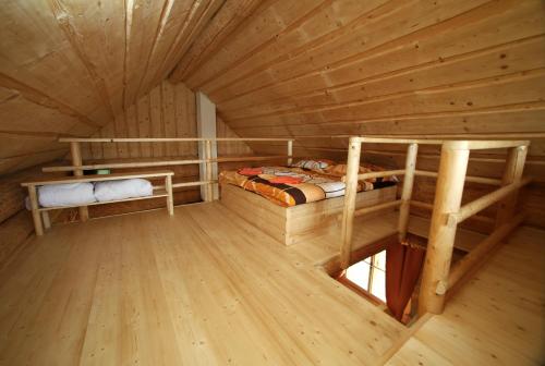 an overhead view of a bedroom in a log cabin at Na Samotě Ve Srubu in Plzeň