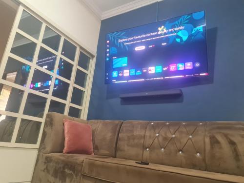 TV a/nebo společenská místnost v ubytování Villa Angel